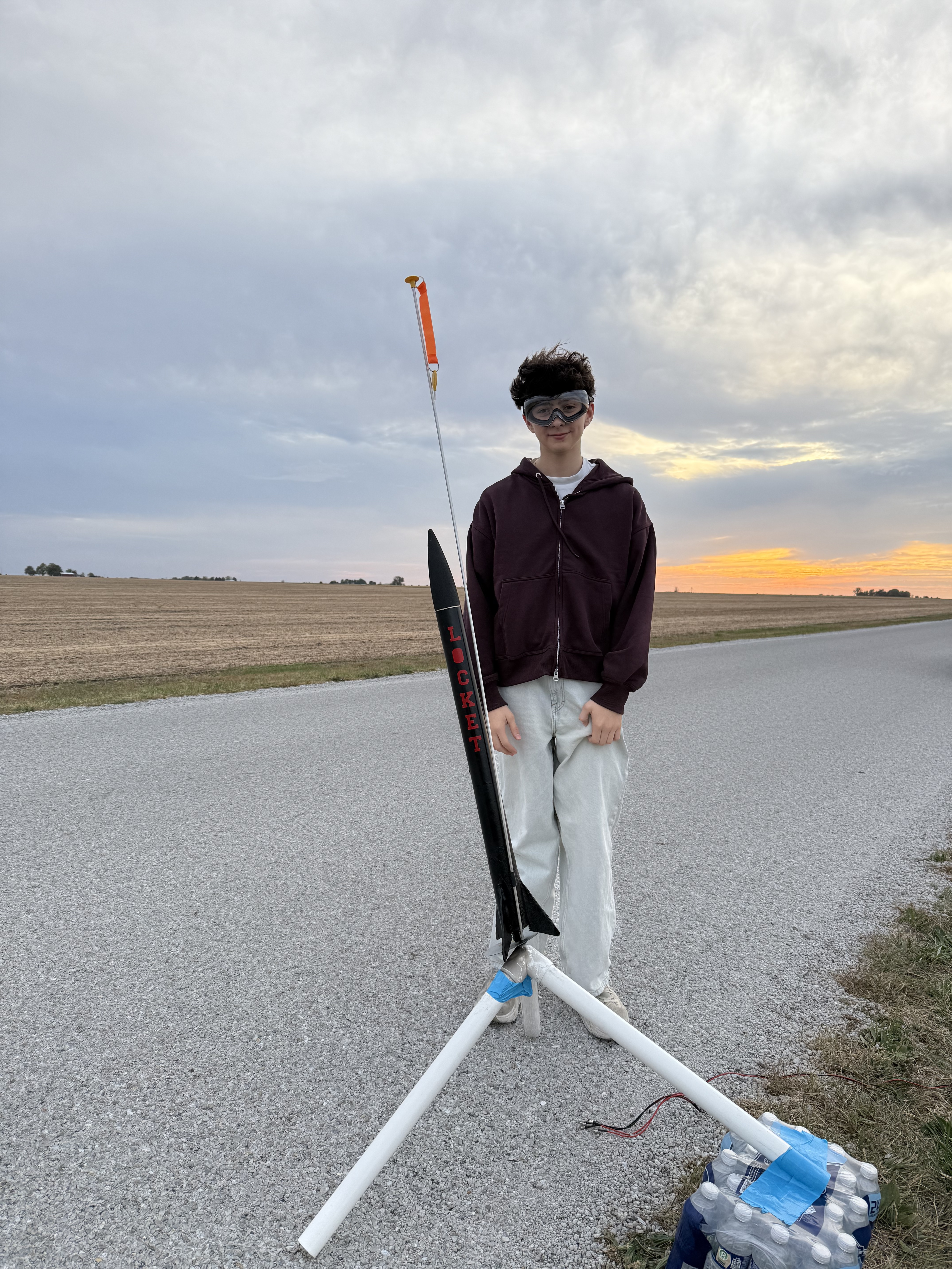 Luka Gruev with a rocket at sunset